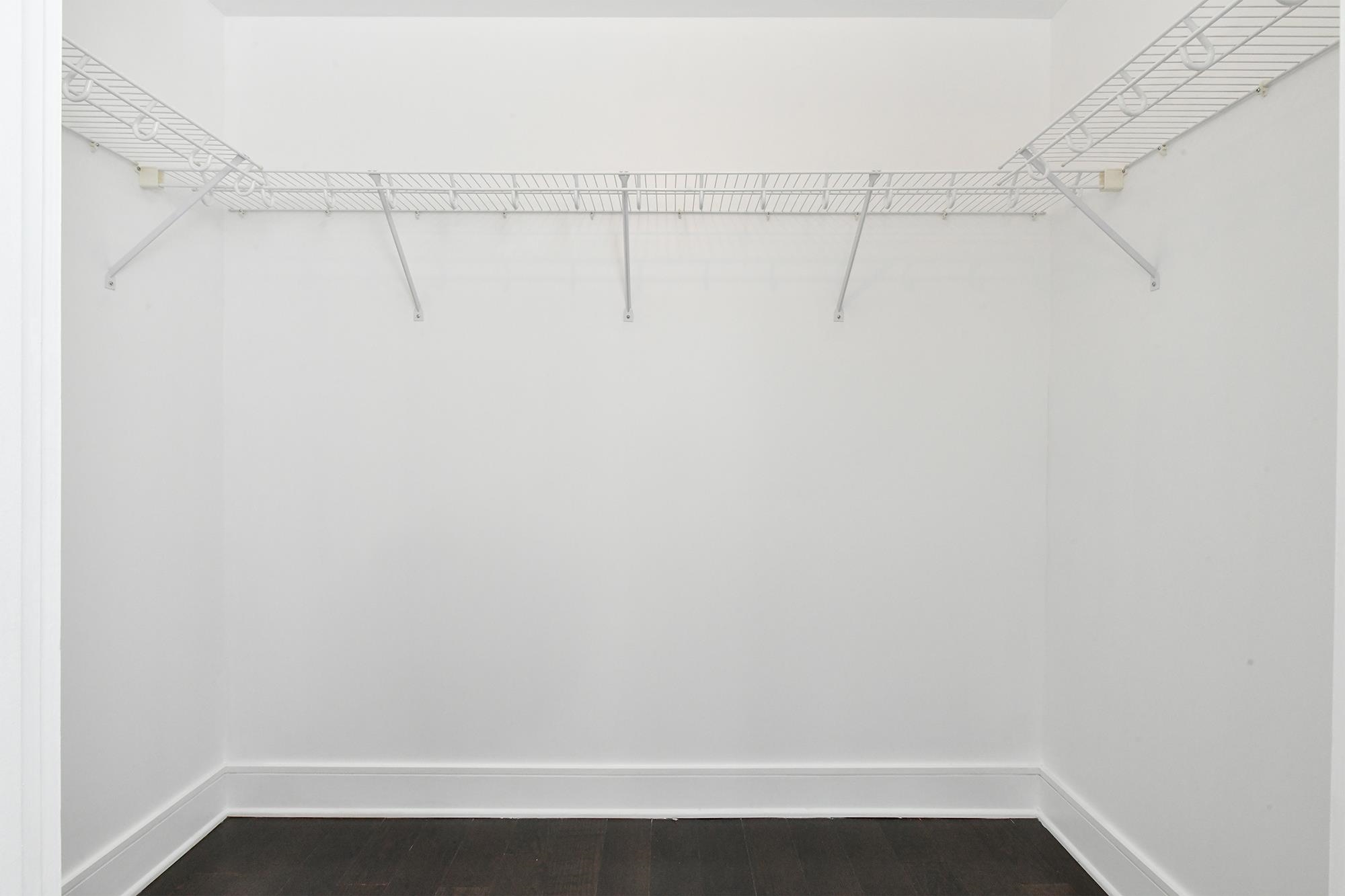 1100 Maxwell Lane, Unit 517 Hoboken, NJ 07030 - Photo 10 of 17 a view of a room with racks on the wall