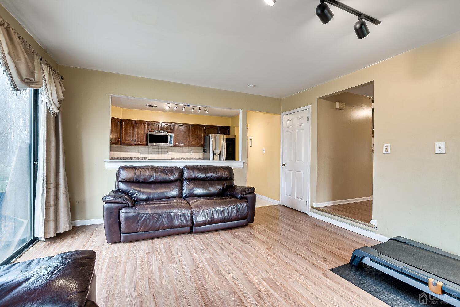 2701 Cricket Circle Edison, NJ 08820 - Photo 22 of 38 a living room with furniture and a wooden floor
