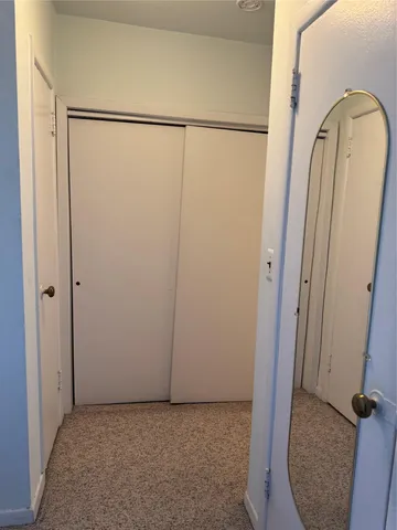 a view of small space with racks on the wall