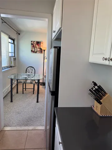 a view of a hallway with workspace