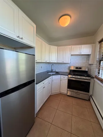 a workspace with furniture and a window