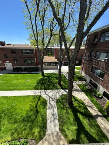 a view of a garden with a bench