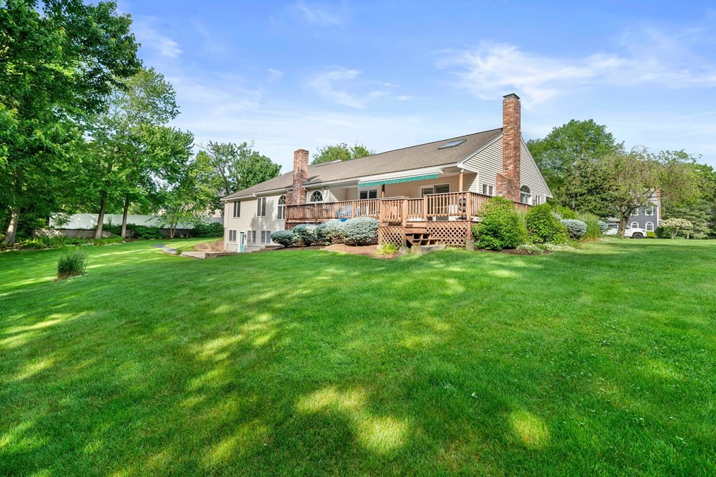 121 Setterland Farm Road Hanover, MA 02339 - Photo 31 of 33 a view of a house with a big yard and large trees