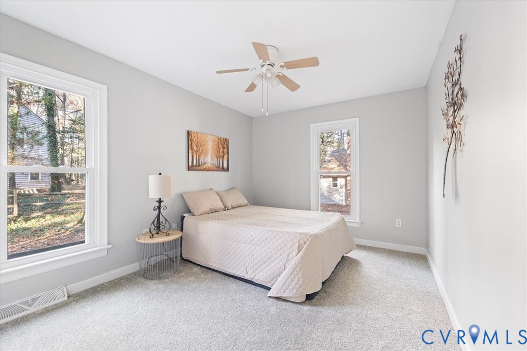 13700 Quail Meadows Lane Midlothian, VA 23112 - Photo 23 of 30 a bedroom with a bed and a window