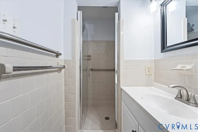 a view of a house with backyard and wooden floor