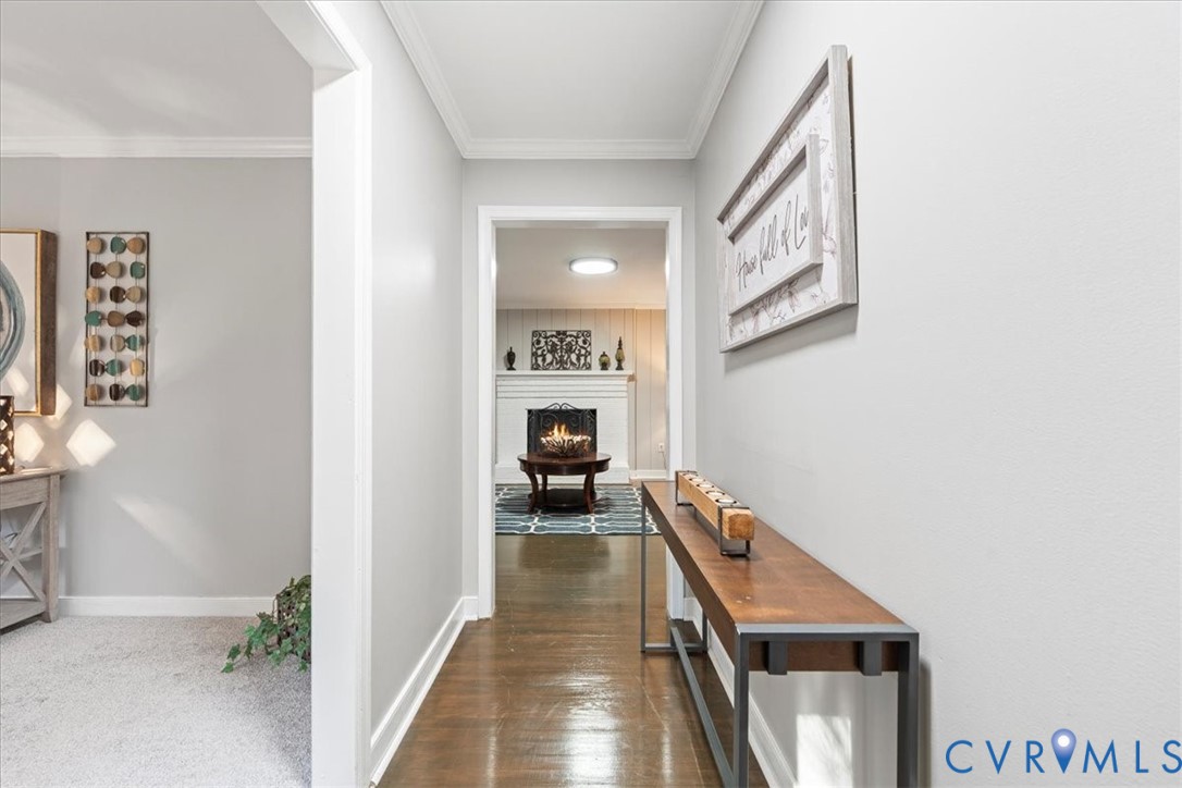 13700 Quail Meadows Lane Midlothian, VA 23112 - Photo 6 of 30 a view of a hallway with wooden floor and staircase