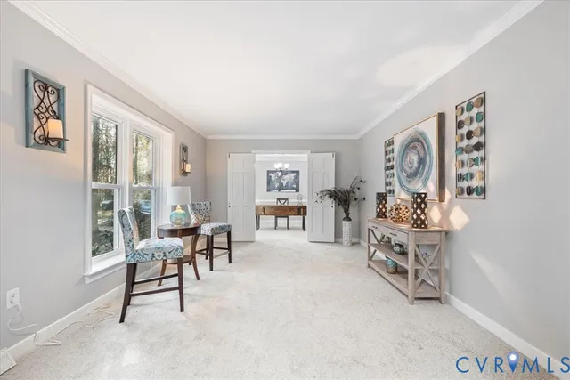 a view of a livingroom with furniture and windows