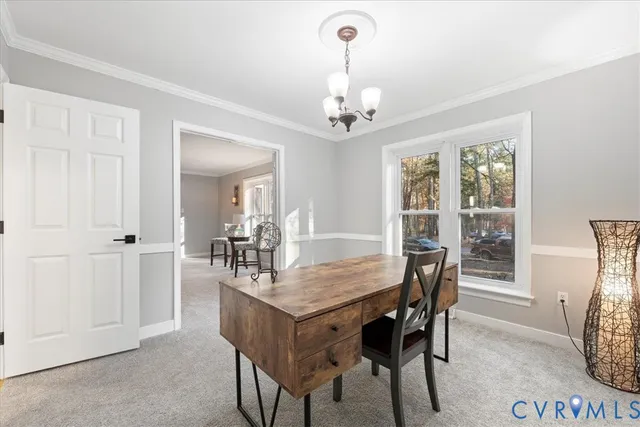a living room with furniture a rug and a fireplace