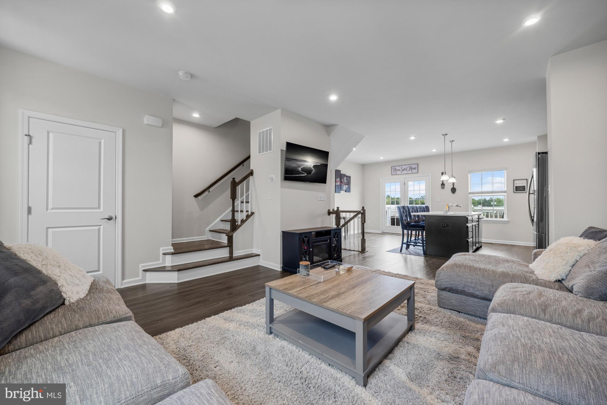 607 Sammy Street Swedesboro, NJ 08085 - Photo 11 of 37 a living room with furniture and a fireplace