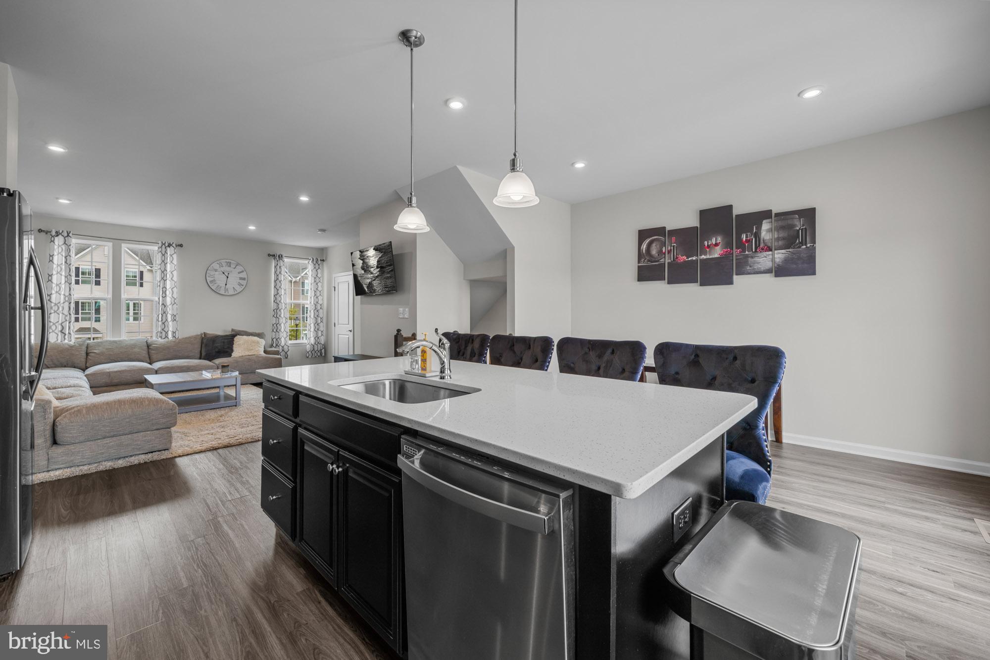 607 Sammy Street Swedesboro, NJ 08085 - Photo 16 of 37 a large kitchen with a table and chairs
