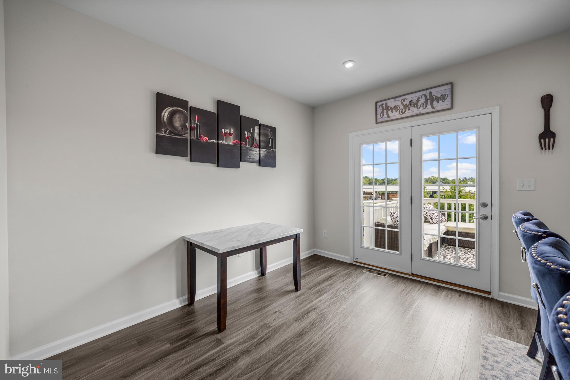 607 Sammy Street Swedesboro, NJ 08085 - Photo 19 of 37 a view of a livingroom with a hardwood floor and a ceiling fan