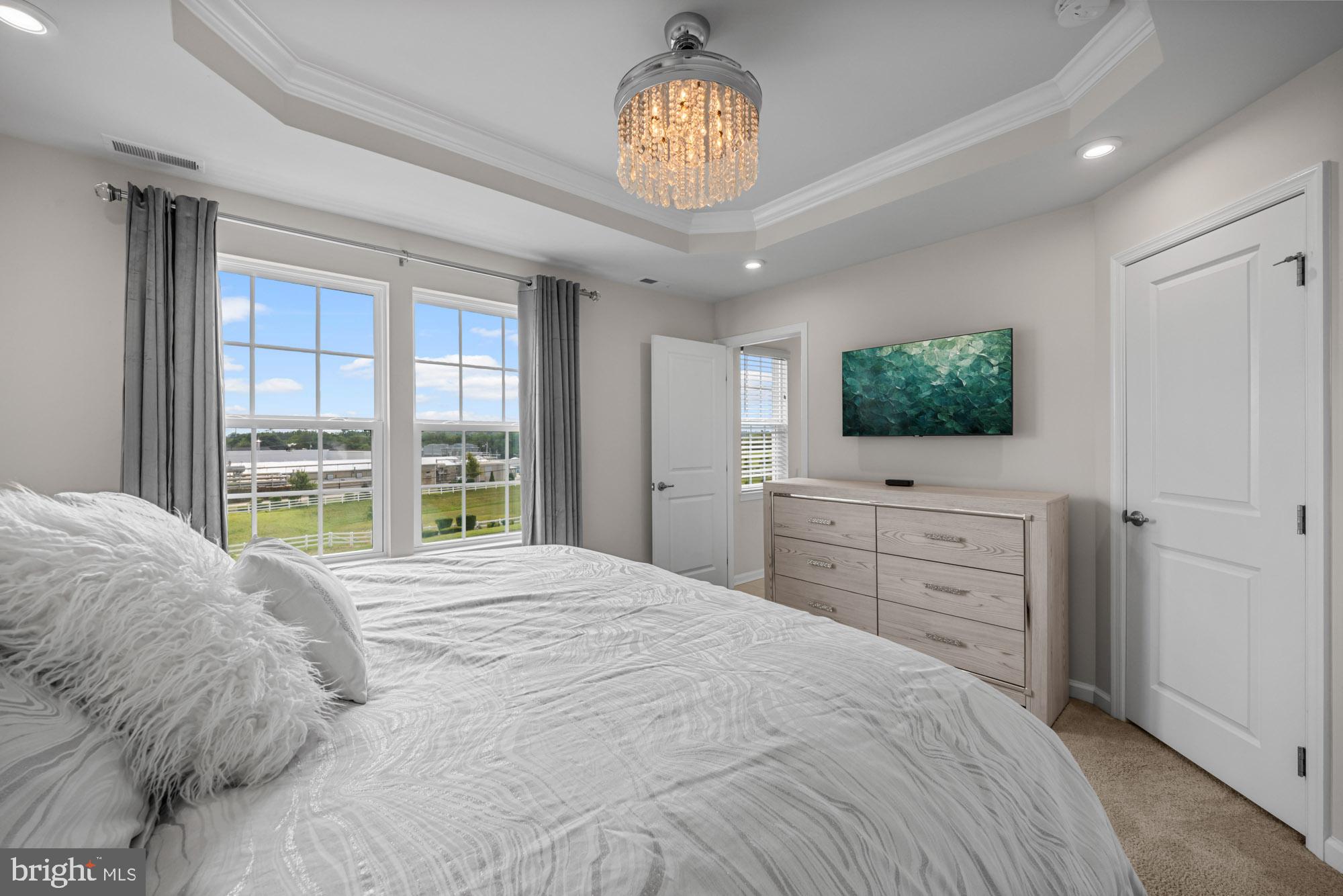 607 Sammy Street Swedesboro, NJ 08085 - Photo 24 of 37 a bedroom with a bed and a flat screen tv