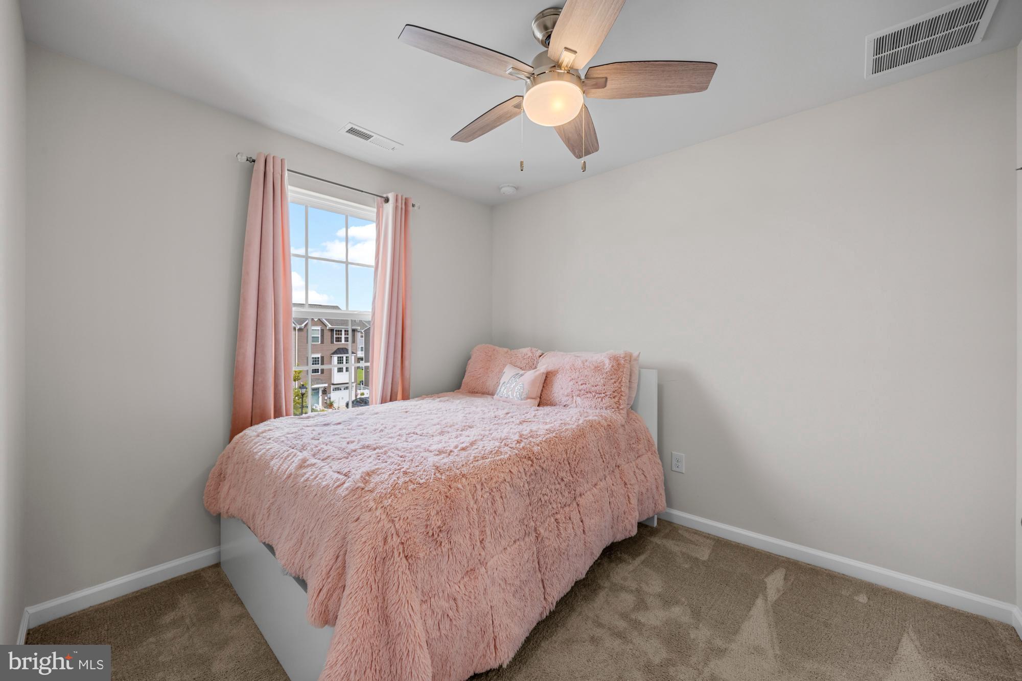 607 Sammy Street Swedesboro, NJ 08085 - Photo 26 of 37 a bedroom with a bed and window