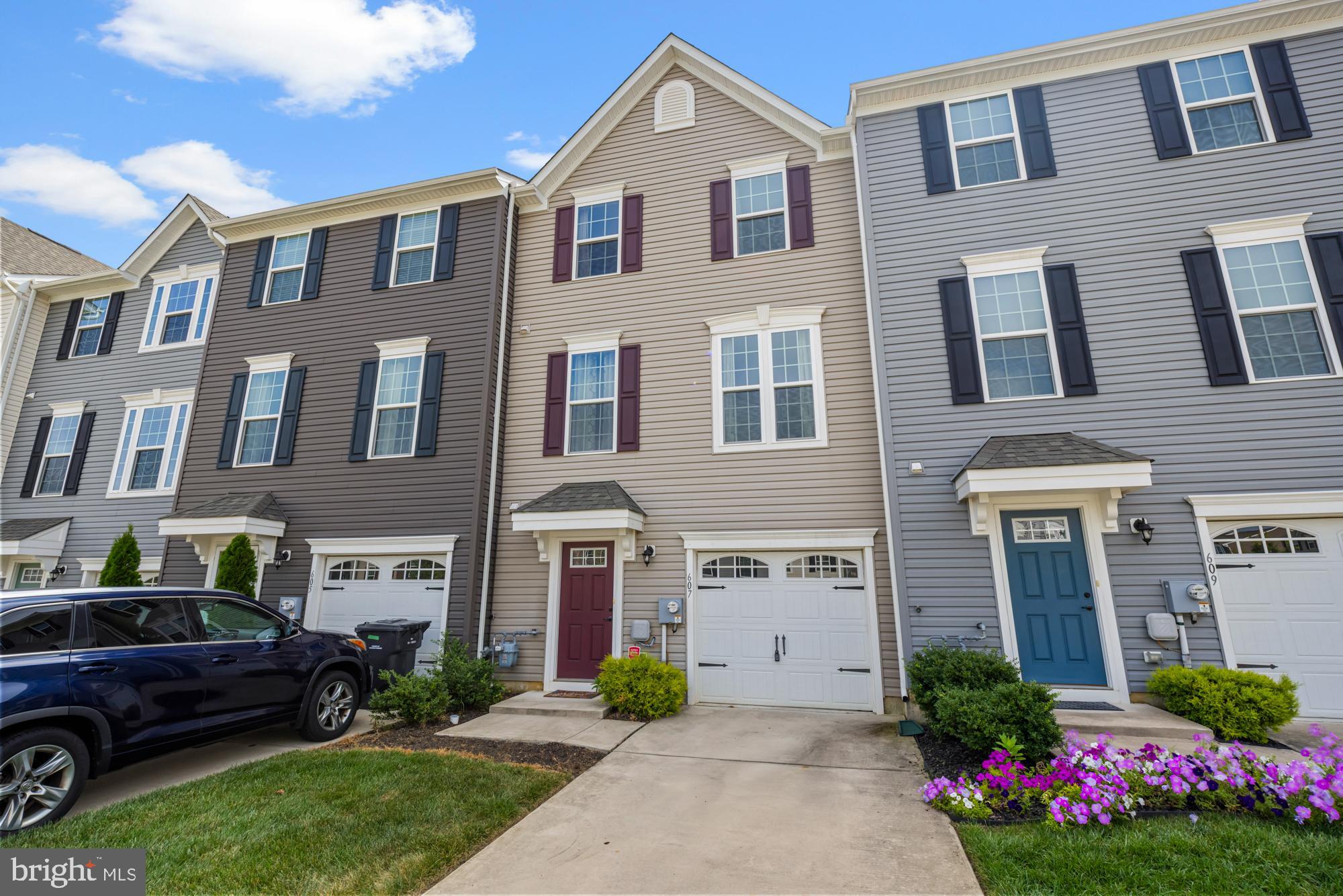 607 Sammy Street Swedesboro, NJ 08085 - Photo 33 of 37 a front view of a house with a garden