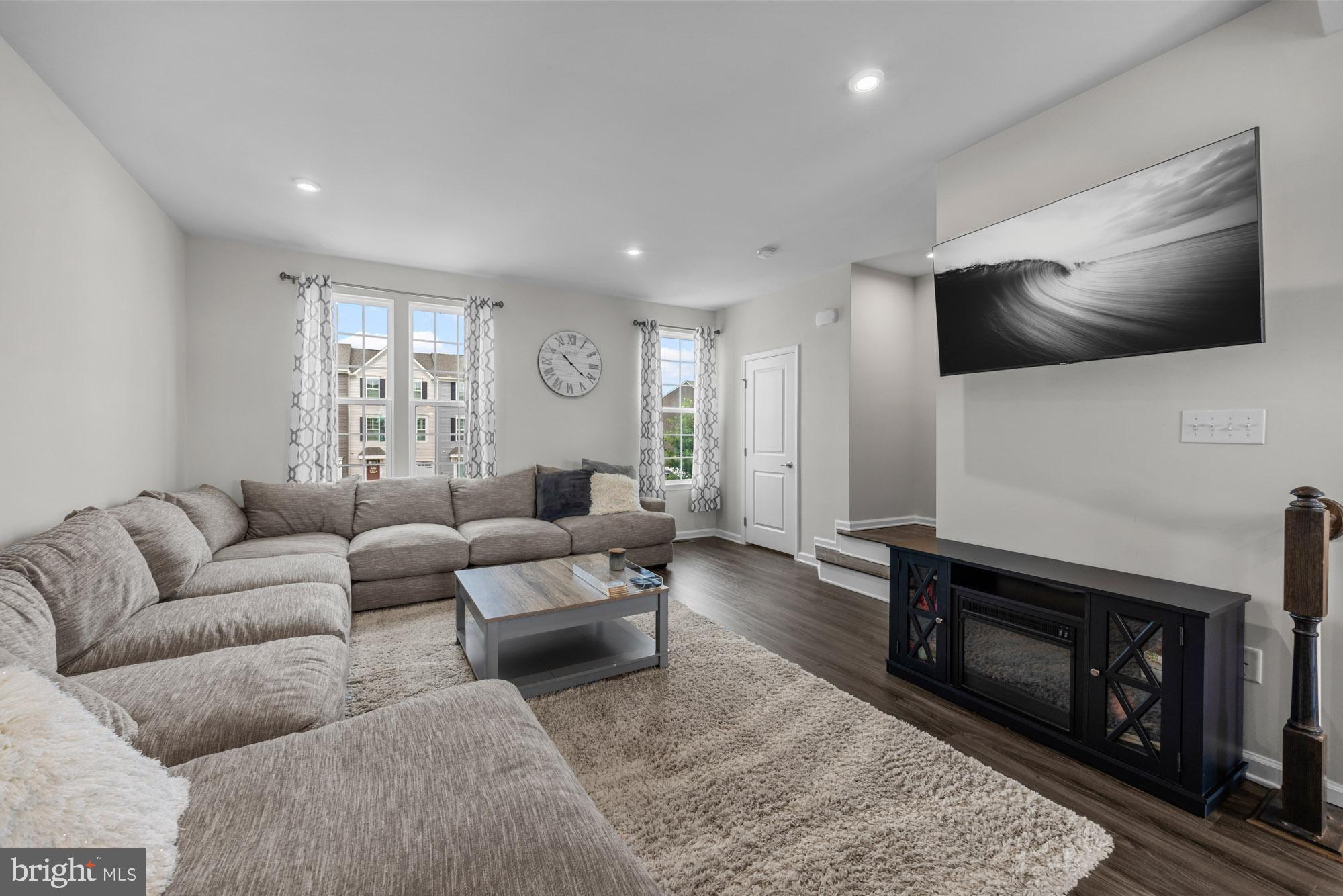 607 Sammy Street Swedesboro, NJ 08085 - Photo 8 of 37 a living room with furniture and a flat screen tv