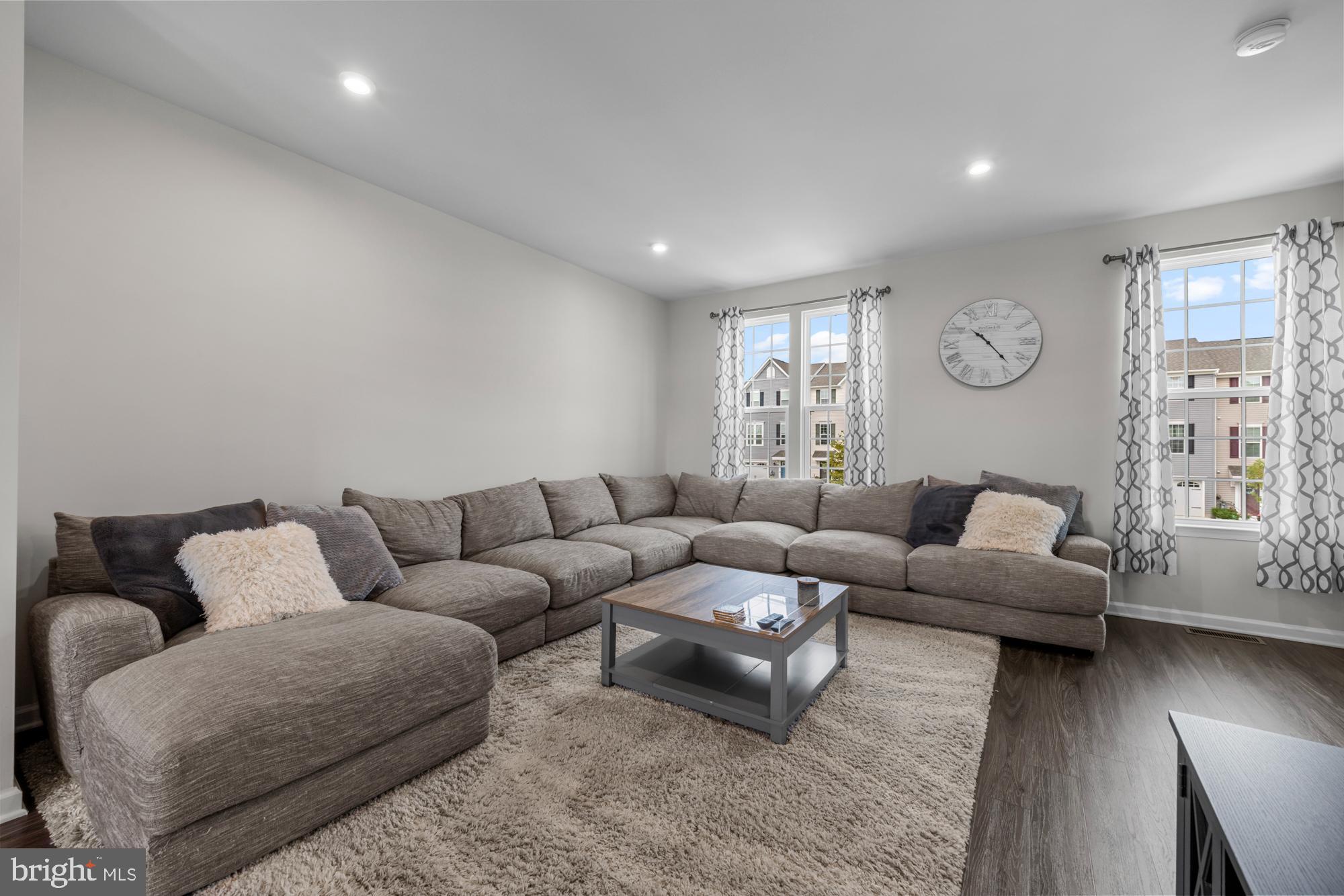 607 Sammy Street Swedesboro, NJ 08085 - Photo 9 of 37 a living room with furniture and a large window