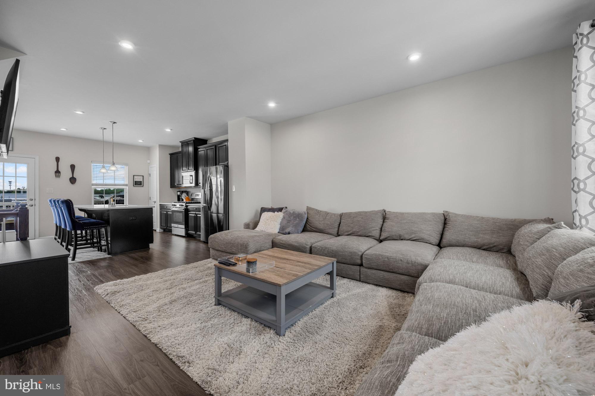607 Sammy Street Swedesboro, NJ 08085 - Photo 10 of 37 a living room with furniture and a couch