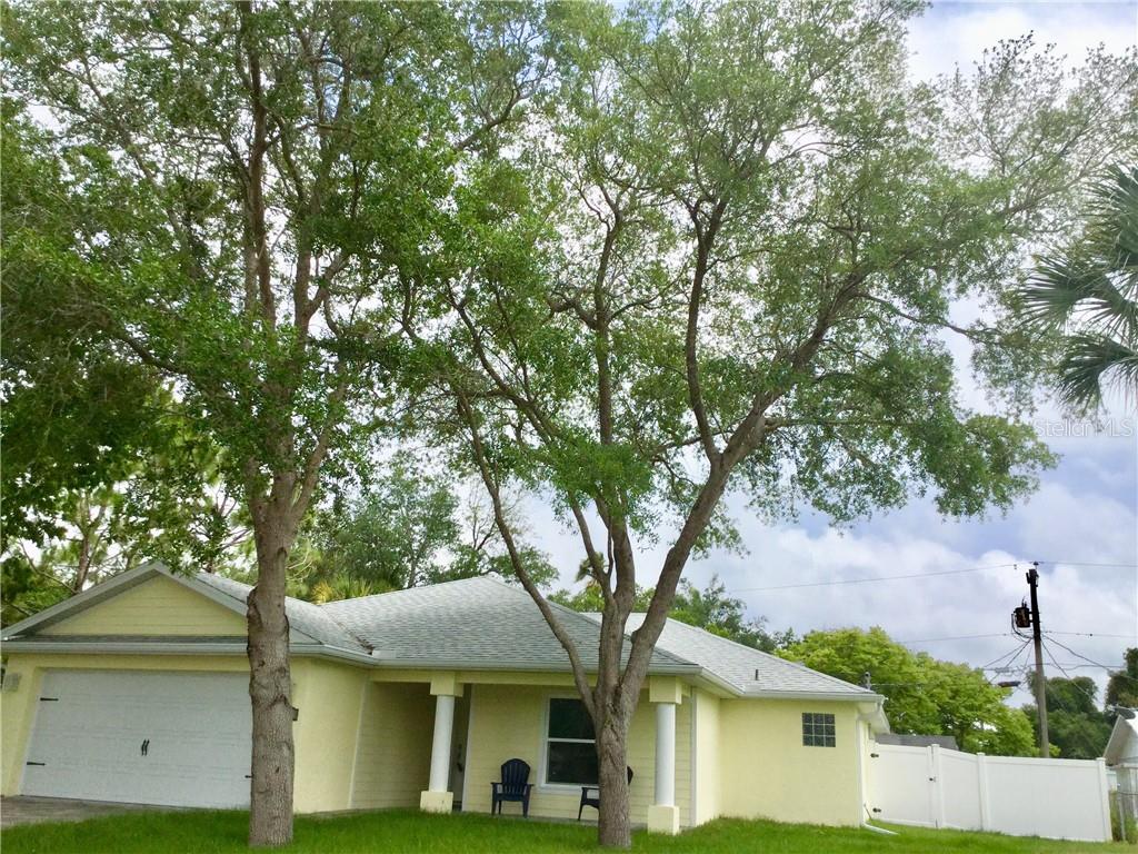 905 Porpoise Road Venice, FL 34293 - Photo 1 of 1 front view of a house with a tree