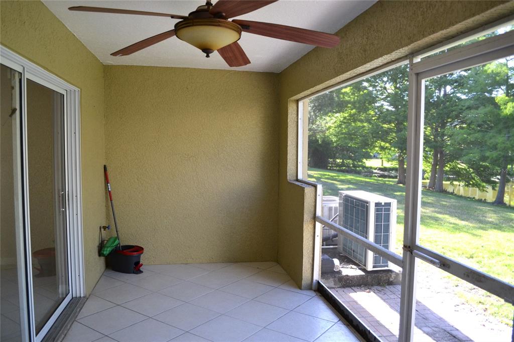 11235 Kapok Grand Circle Madeira Beach, FL 33708 - Photo 16 of 34 a view of an empty room and window