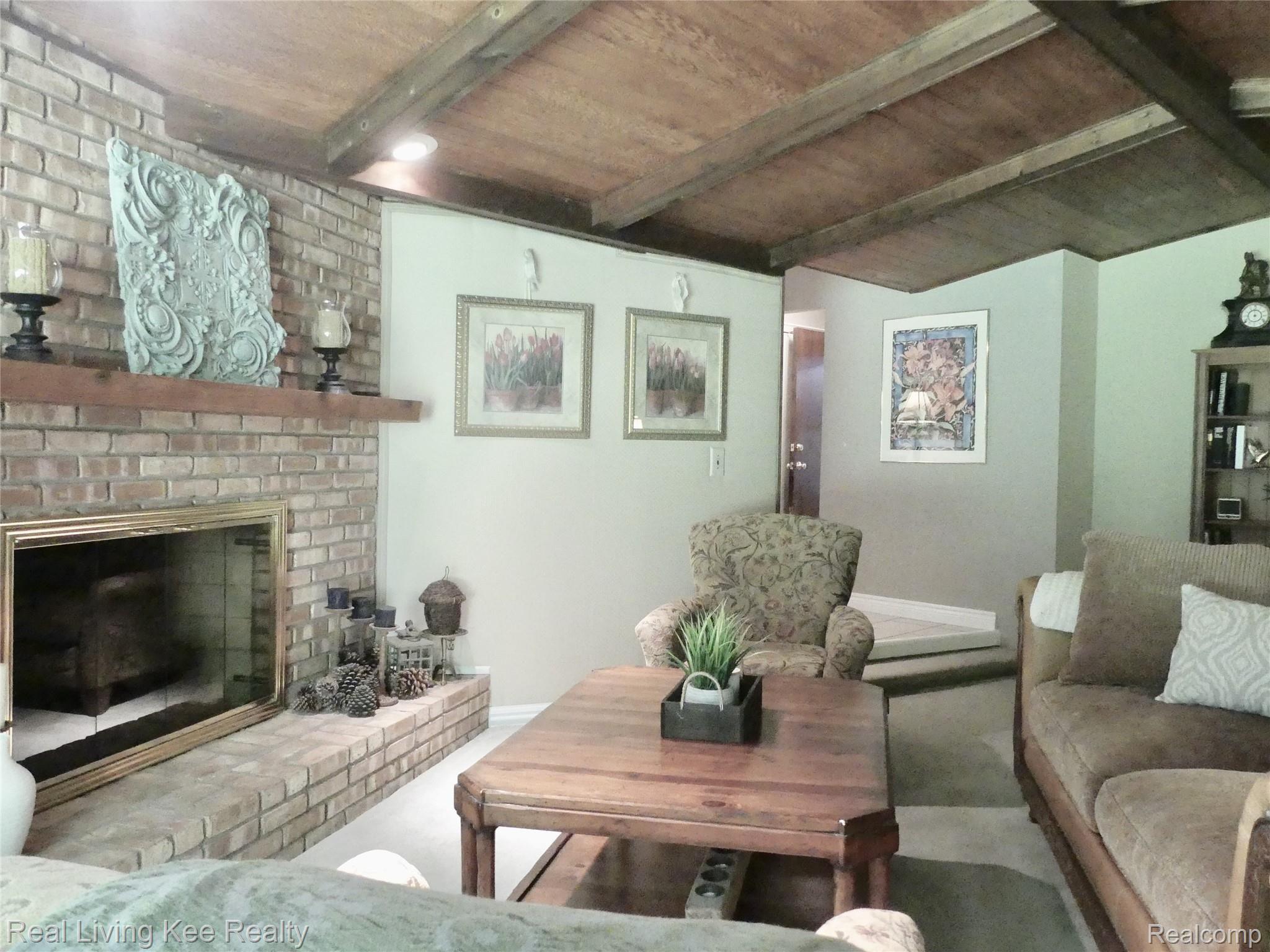 219 Beechview Drive Rochester, MI 48306 - Photo 26 of 64 Living room with gas fireplace