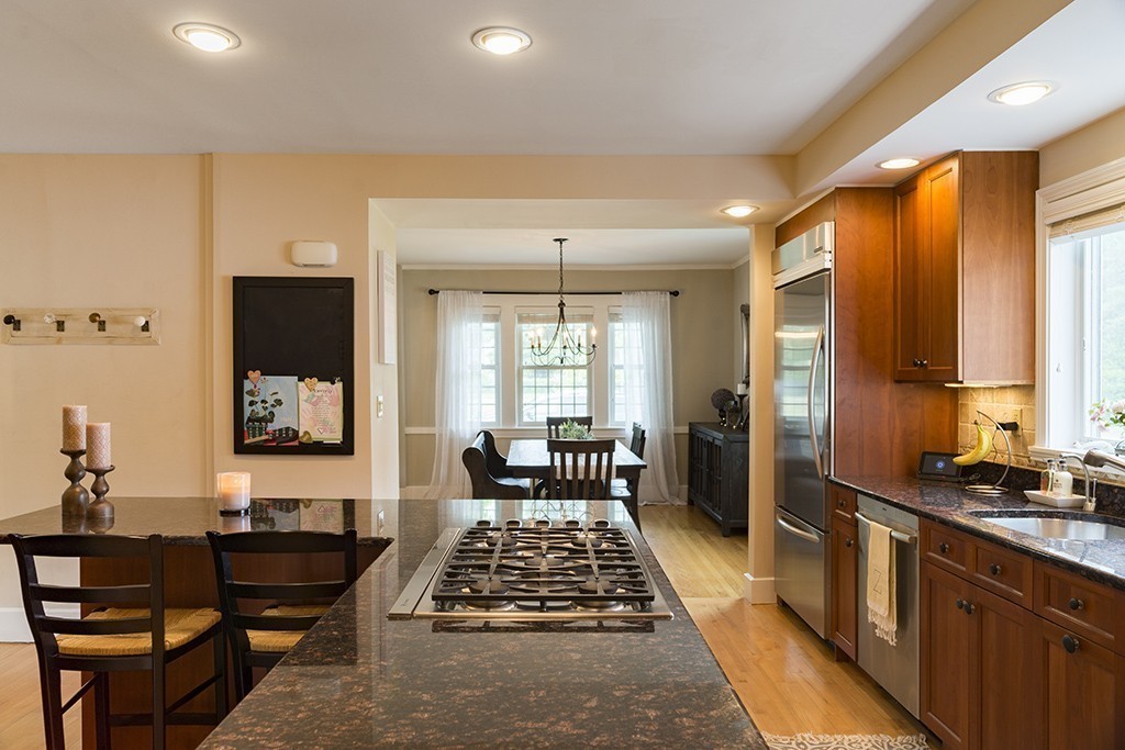 5 Hidden Road Andover, MA 01810 - Photo 11 of 30 a living room with furniture flat screen tv and a window