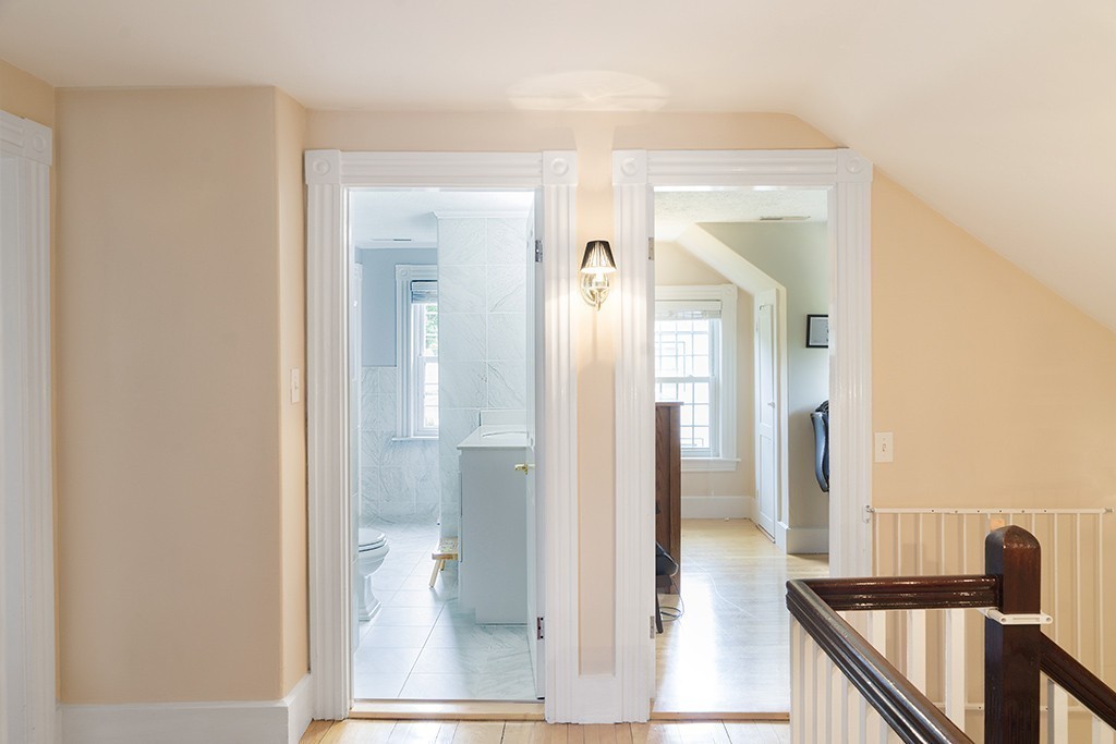 5 Hidden Road Andover, MA 01810 - Photo 19 of 30 a view of a bathroom from a hallway