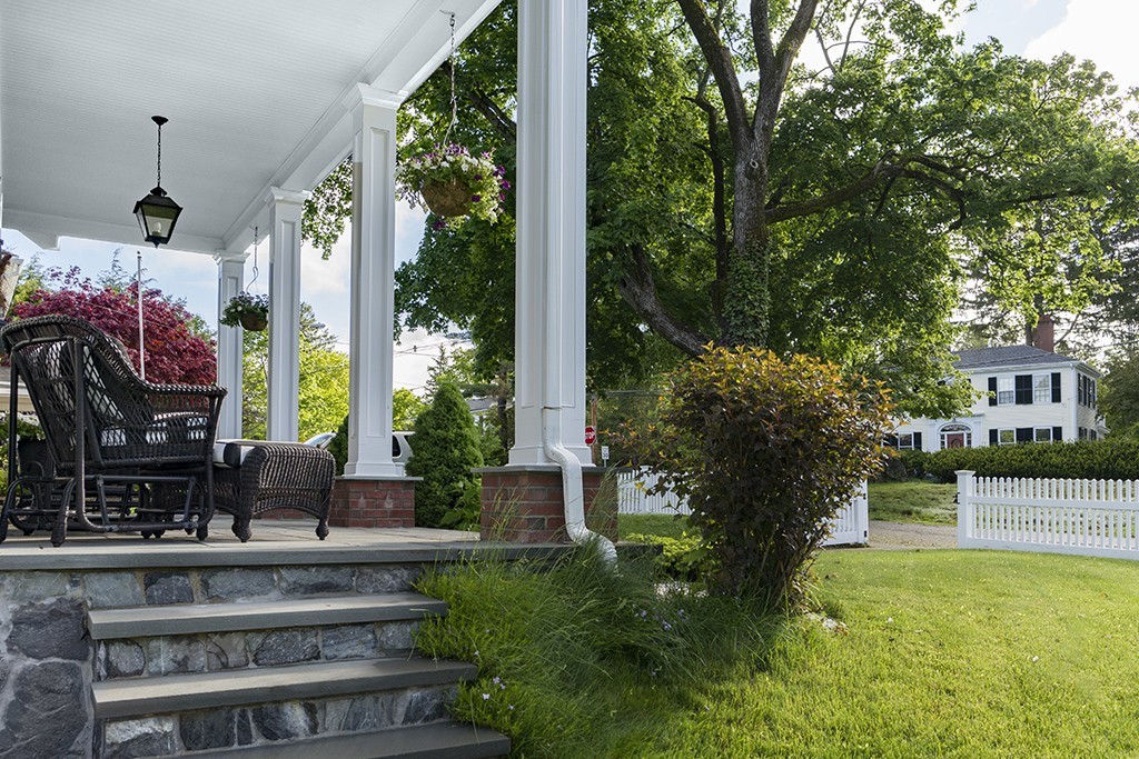 5 Hidden Road Andover, MA 01810 - Photo 2 of 30 a front view of a house with garden