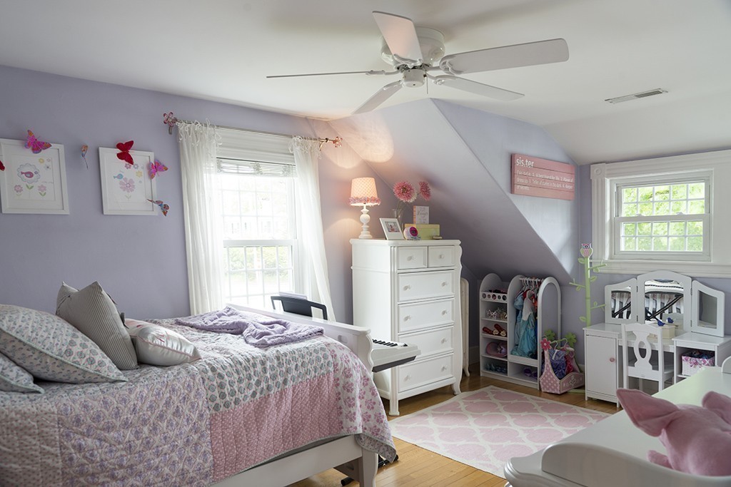 5 Hidden Road Andover, MA 01810 - Photo 22 of 30 a bedroom with a bed and a window