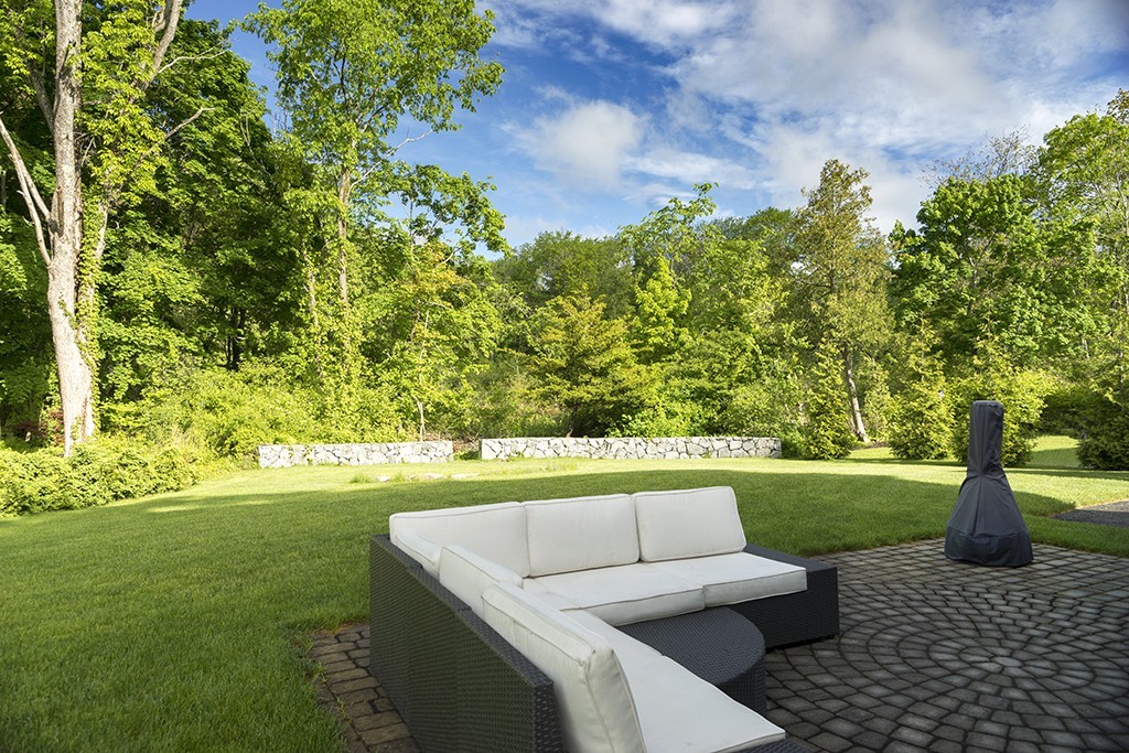 5 Hidden Road Andover, MA 01810 - Photo 28 of 30 a view of a garden with an outdoor seating