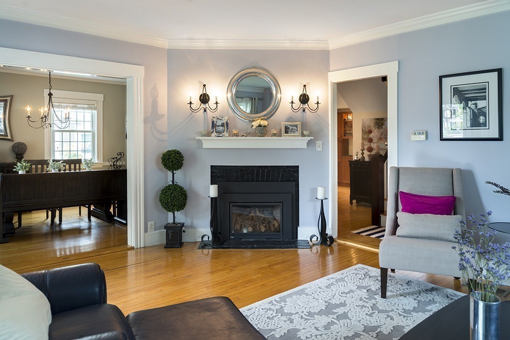 5 Hidden Road Andover, MA 01810 - Photo 7 of 30 a living room with furniture and a fireplace