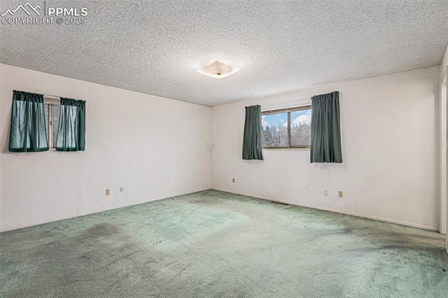 1653 Cragin Road Colorado Springs, CO 80920 - Photo 14 of 27 Primary Bedroom