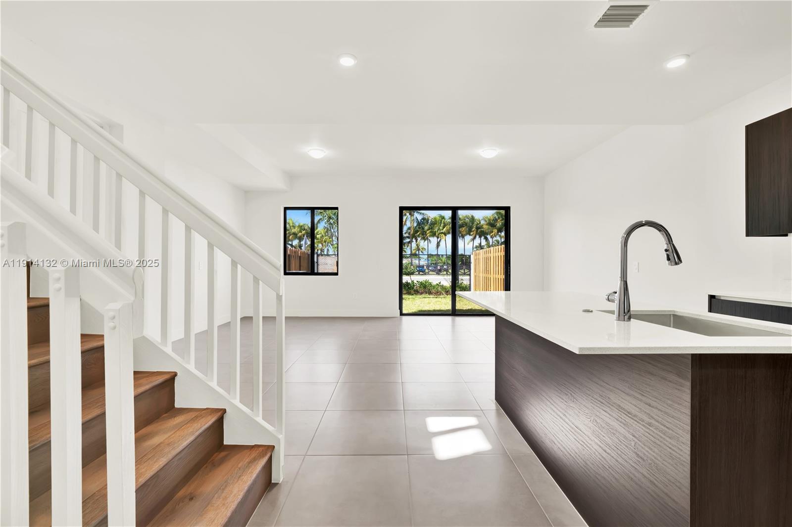 34520 Southwest 191st Court, Unit 34520 Homestead, FL 33034 - Photo 11 of 37 a view of entryway and hall with wooden floor