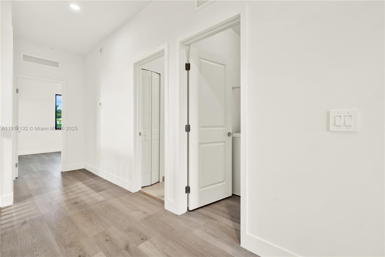 34520 Southwest 191st Court, Unit 34520 Homestead, FL 33034 - Photo 18 of 37 a view of a hallway with wooden floor