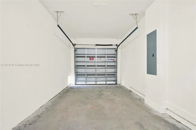 a view of empty room with stairs