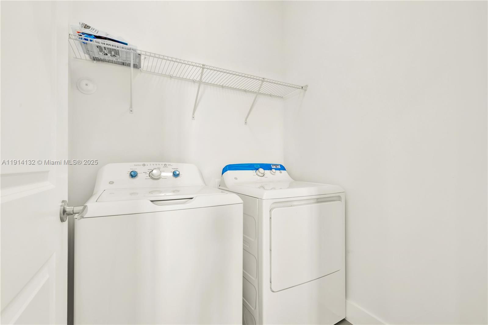 34520 Southwest 191st Court, Unit 34520 Homestead, FL 33034 - Photo 27 of 37 a utility room with dryer and washer