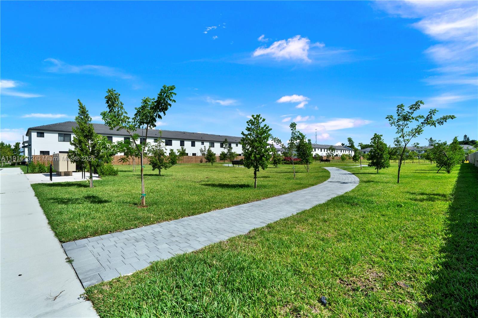 34520 Southwest 191st Court, Unit 34520 Homestead, FL 33034 - Photo 35 of 37 a view of a golf course with a fountain