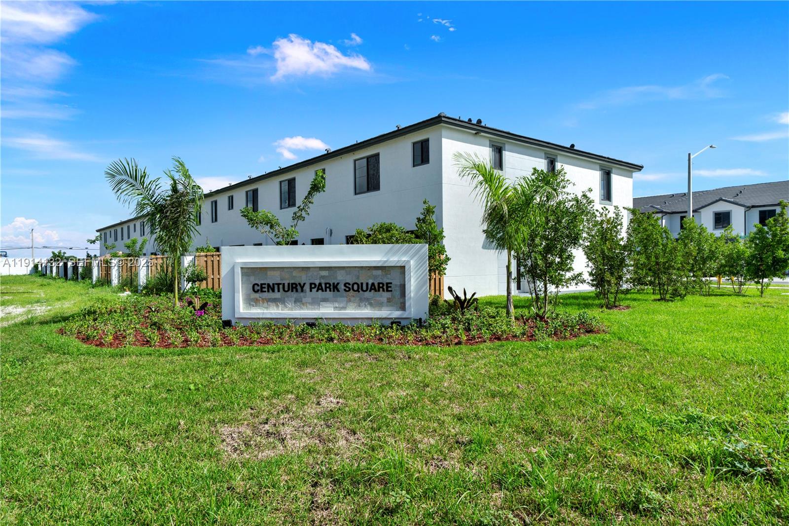 34520 Southwest 191st Court, Unit 34520 Homestead, FL 33034 - Photo 37 of 37 a front view of a house with garden