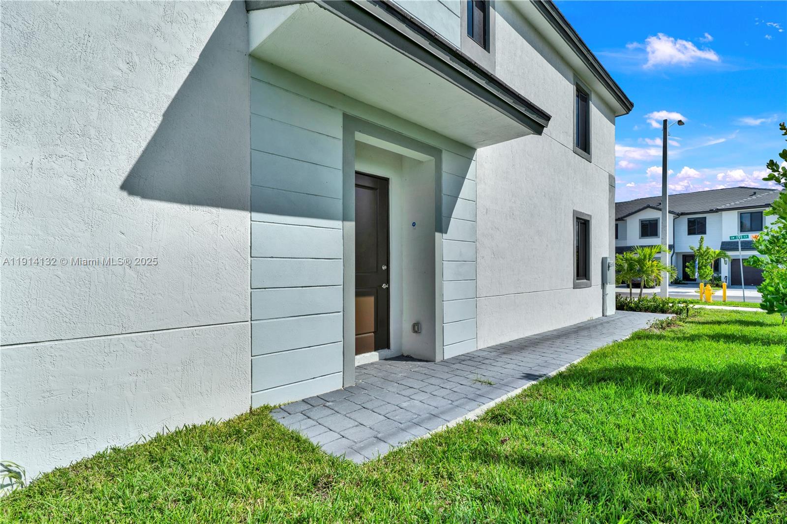 34520 Southwest 191st Court, Unit 34520 Homestead, FL 33034 - Photo 5 of 37 a view of a back yard of the house
