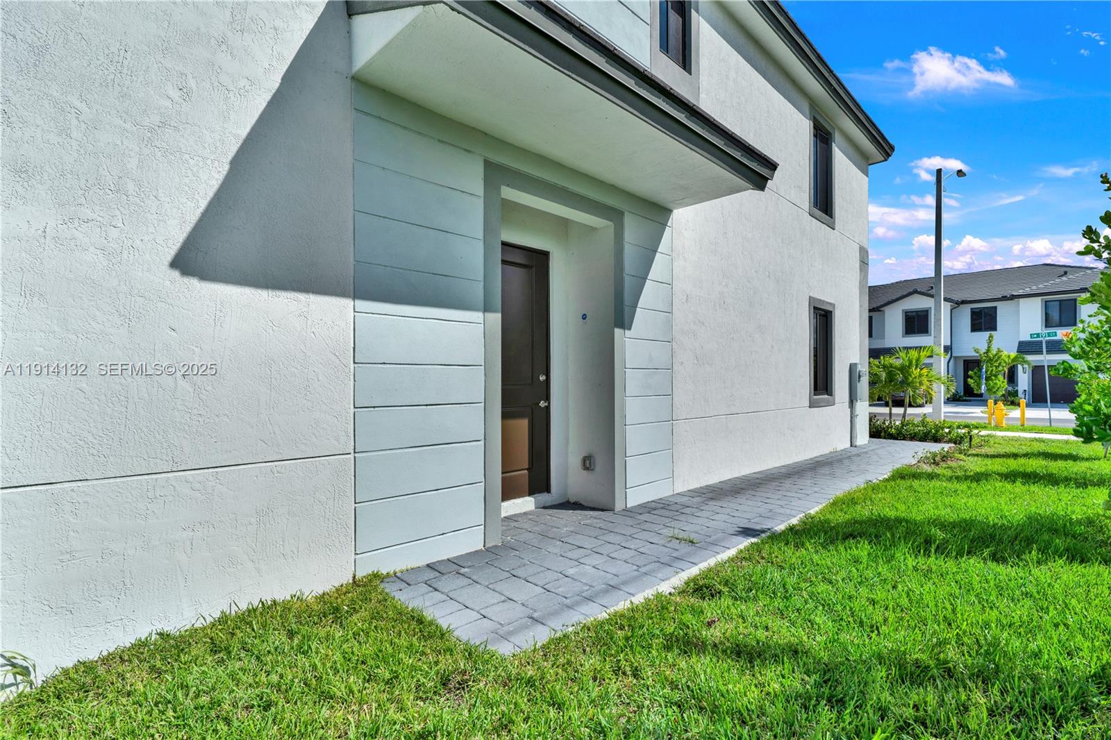 34520 Southwest 191st Court, Unit 34520 Homestead, FL 33034 - Photo 5 of 37 a view of a back yard of the house