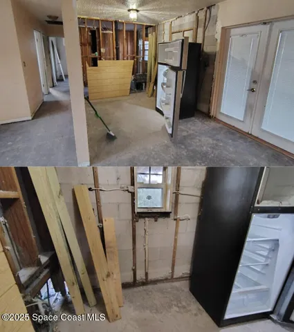 a view of a living room with furniture and a flat screen tv