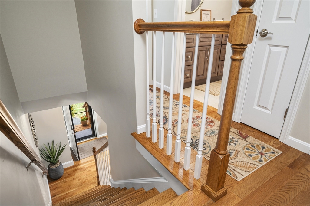 16 Farnum Street, Unit 16 Uxbridge, MA 01569 - Photo 17 of 34 a view of wooden floor in a living room