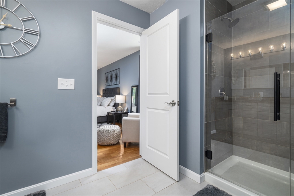 16 Farnum Street, Unit 16 Uxbridge, MA 01569 - Photo 21 of 34 a en suite bathroom with a shower