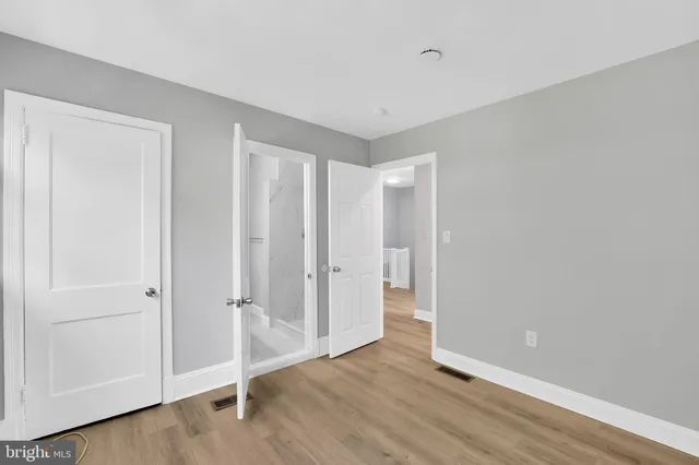 a view of a livingroom with wooden floor