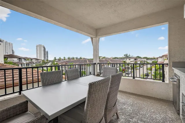 a picture of door with a kitchen view