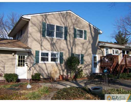 12 Bruning Road East Brunswick, NJ 08816 - Photo 8 of 9 a front view of a house with a yard