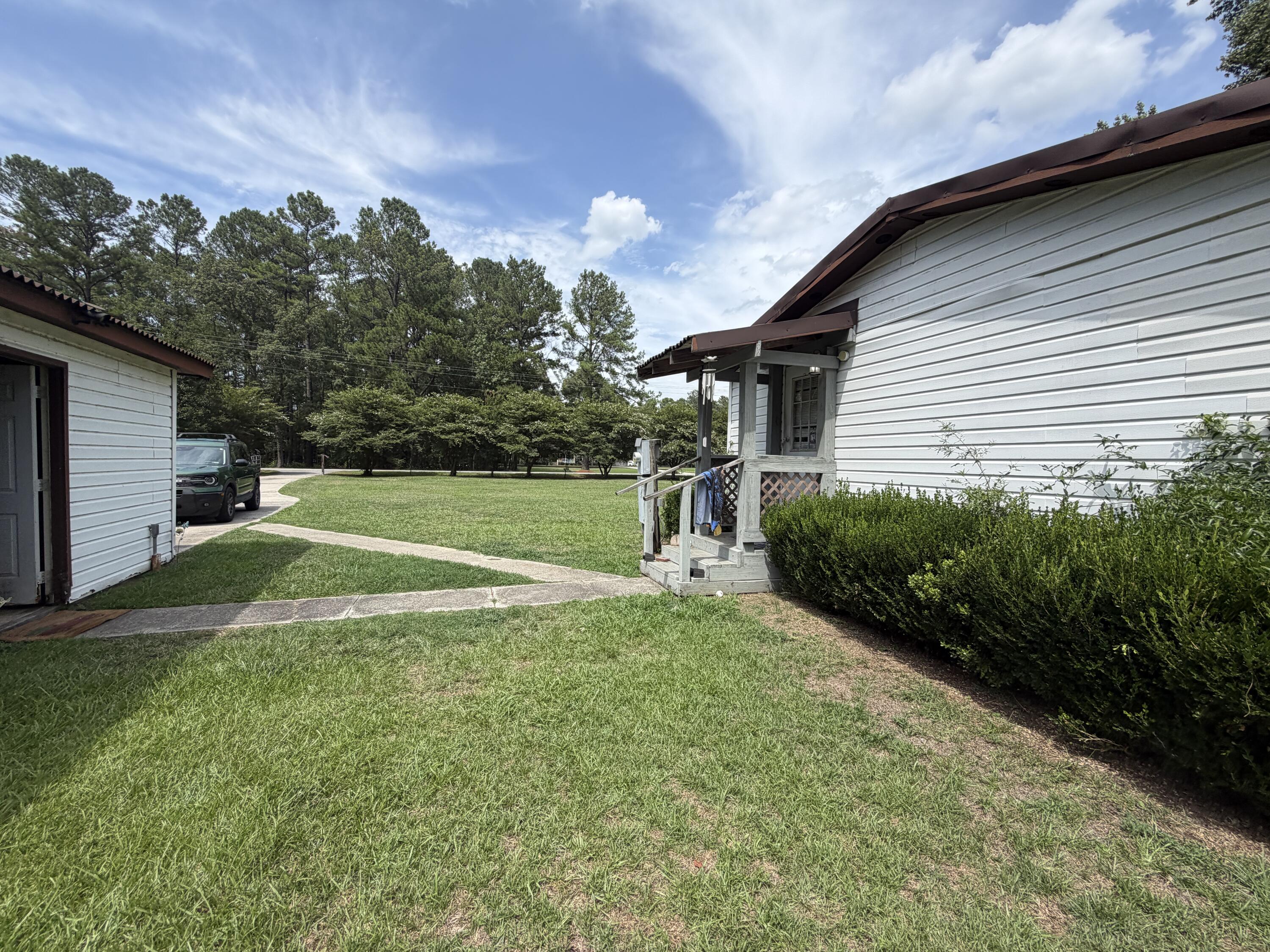 1097 Bethera Road Bonneau, SC 29431 - Photo 8 of 10 20260723_190856175_iOS 1