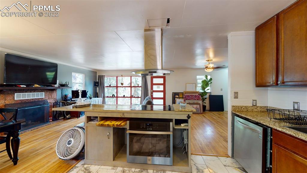 9955 Mesa Road Cascade, CO 80809 - Photo 15 of 30 a kitchen with a table and chairs in it
