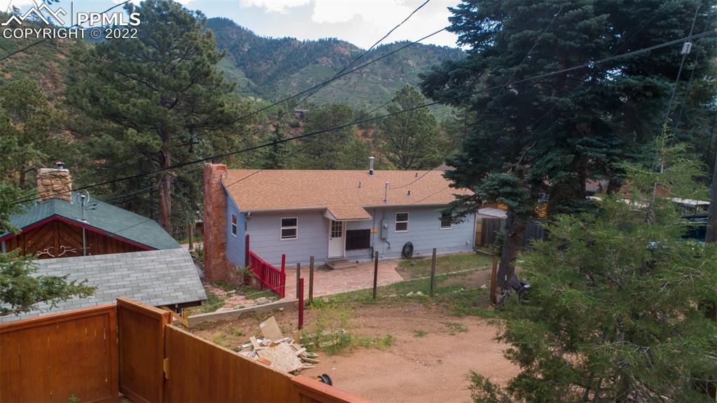 9955 Mesa Road Cascade, CO 80809 - Photo 5 of 30 an aerial view of a house