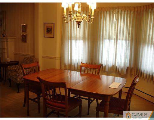 145 Rector Street Perth Amboy, NJ 08861 - Photo 6 of 17 a view of a dining room with furniture and window