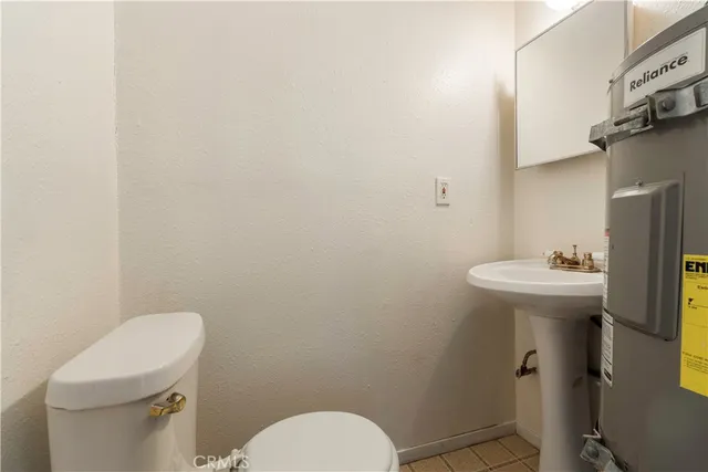 a bathroom with a sink a toilet